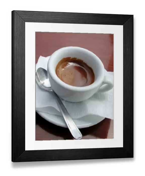Framed Print : Small cup of strong espresso coffee, served in outdoor cafe in Amalfi, Italy credit
