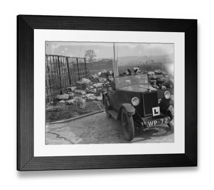 Framed Print : An alsation sits in the passenger seat of a learners car. 1936 Framed Print : An alsation sits in the passenger seat of a learners car. 1936