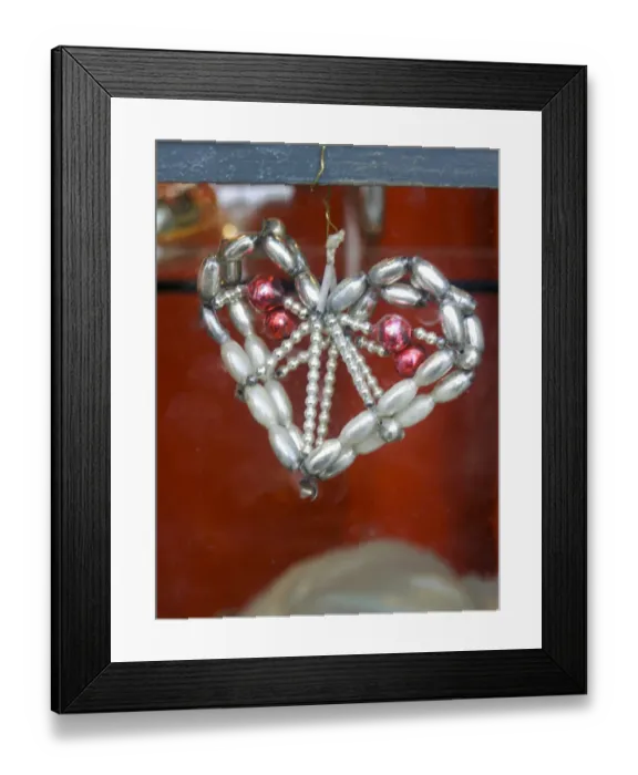 Framed Print : Decorative antique Christmas hanging bauble in shop window in Gothenburg, Sweden credit