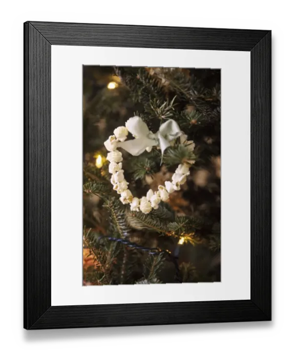 Framed Print : Christmas tree decoration of popped corn threaded in heart shape credit: Marie-Louise Framed Print : Christmas tree decoration of popped corn threaded in heart shape credit: Marie-Louise