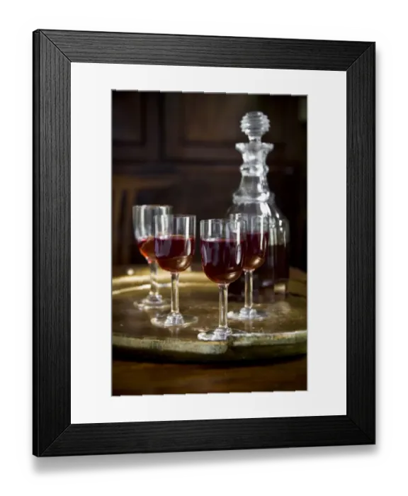 Framed Print : A tray of glasses of sloe gin with unstoppered decanter. credit: Marie-Louise Avery