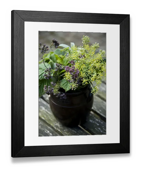 Framed Print : Bouquet of culinary herbs in swedish preserving crock credit: Marie-Louise Avery