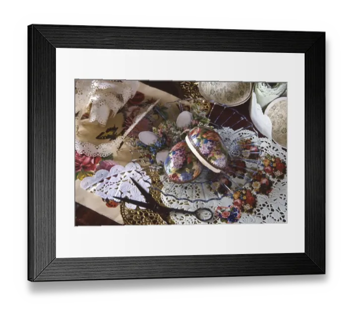 Framed Print : The Victorian art of decoupage - doileys, paper lace and flower designs cut out Framed Print : The Victorian art of decoupage - doileys, paper lace and flower designs cut out