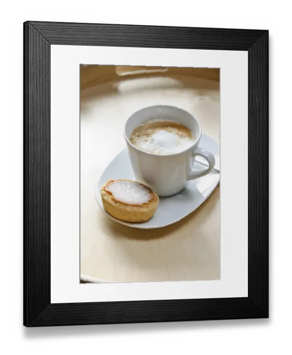 Framed Print : Cup of cappuccino with spiral of cocoa dusted on top with a mazarin - Swedish almond Framed Print : Cup of cappuccino with spiral of cocoa dusted on top with a mazarin - Swedish almond