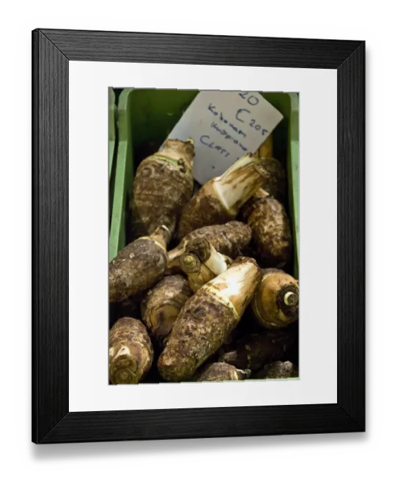 Framed Print : Kolokassi (eddo) for sale in covered market in Limassol, Cyprus credit: Marie-Louise