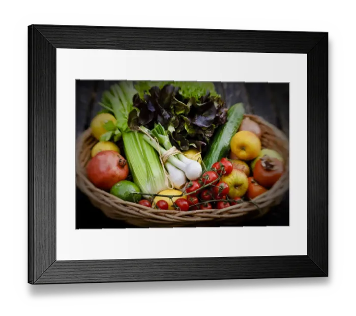 Framed Print : Basket of fresh fruit and vegetables on red surface credit: Marie-Louise Avery Framed Print : Basket of fresh fruit and vegetables on red surface credit: Marie-Louise Avery