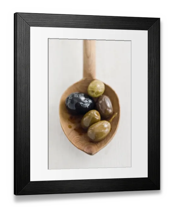 Framed Print : Selecion of various good whole olives on rustic wooden spoon credit: Marie-Louise Framed Print : Selecion of various good whole olives on rustic wooden spoon credit: Marie-Louise