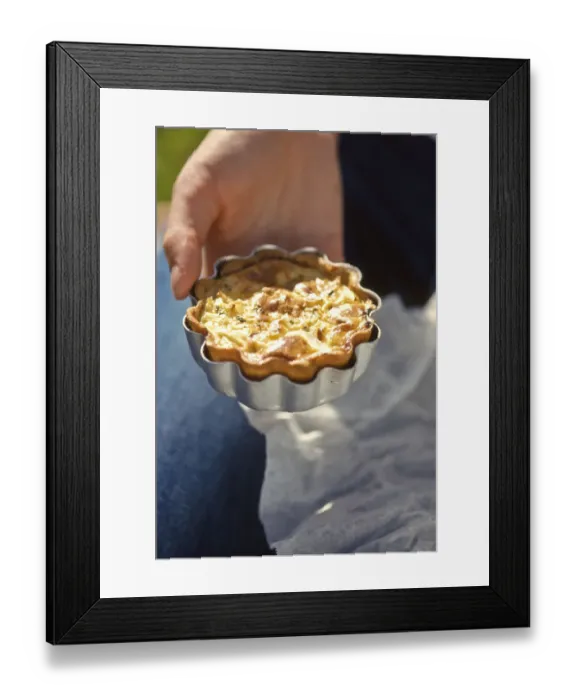 Framed Print : Home made quiche in its tin held in the hand credit: Marie-Louise Avery / thePictureKitchen Framed Print : Home made quiche in its tin held in the hand credit: Marie-Louise Avery / thePictureKitchen
