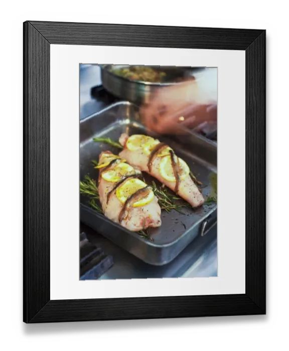 Framed Print : Fillets of monkfish in pan ready to be roasted on bed of rosemary with lemon Framed Print : Fillets of monkfish in pan ready to be roasted on bed of rosemary with lemon