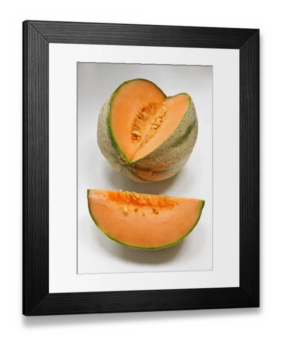 Framed Print : Cantaloupe melon wit section cut out on white background credit: Marie-Louise Avery Framed Print : Cantaloupe melon wit section cut out on white background credit: Marie-Louise Avery