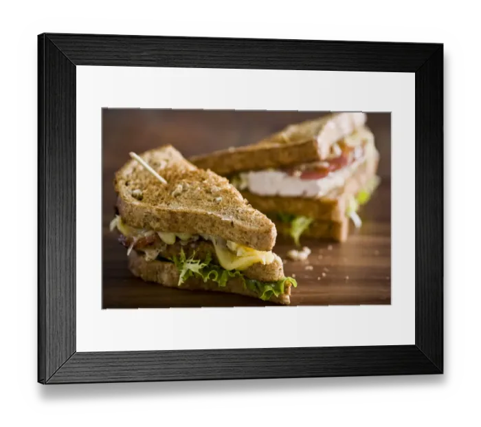 Framed Print : Toasted club sandwich with chicken, cheese, tomatoes, and lettuce on brown bread Framed Print : Toasted club sandwich with chicken, cheese, tomatoes, and lettuce on brown bread