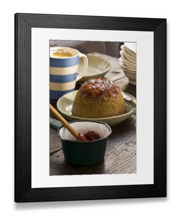 Framed Print : Traditional steamed sponge pudding with walnits and rhubarb compote and custard Framed Print : Traditional steamed sponge pudding with walnits and rhubarb compote and custard