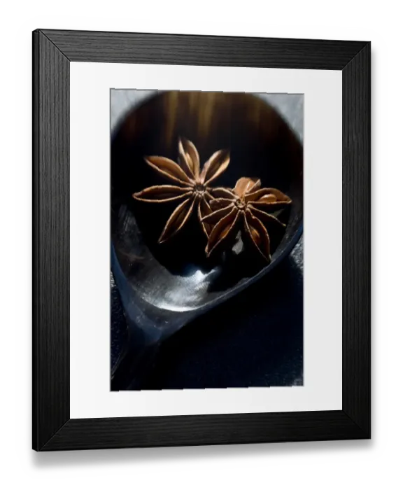 Framed Print : Dried Star anise fruits in small bowl. Also known as star aniseed, badiane or Chinese