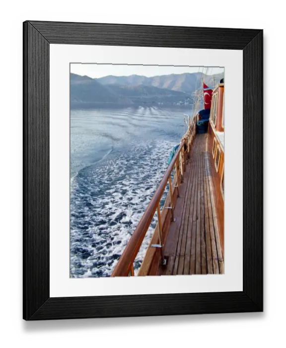 Framed Print : Looking back at the wake of Turkish gulet sailing among Greek islands in early morning