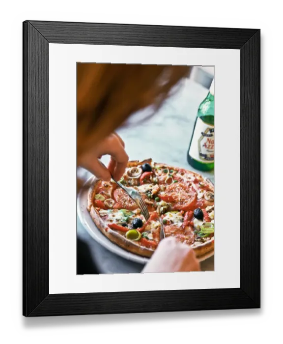 Framed Print : Eating pizza in Pizza Express restaurant, with bottle of Nastro Azzuro beer. credit Framed Print : Eating pizza in Pizza Express restaurant, with bottle of Nastro Azzuro beer. credit