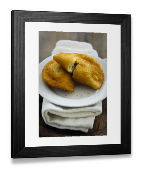 Framed Print : Portuguese snack food, empanadas de camarao, shrimp pasties on white plate credit