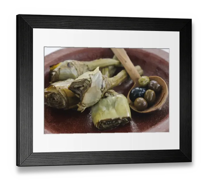 Framed Print : Italian grilled and marinated artichokes on brown dish credit: Marie-Louise Avery Framed Print : Italian grilled and marinated artichokes on brown dish credit: Marie-Louise Avery