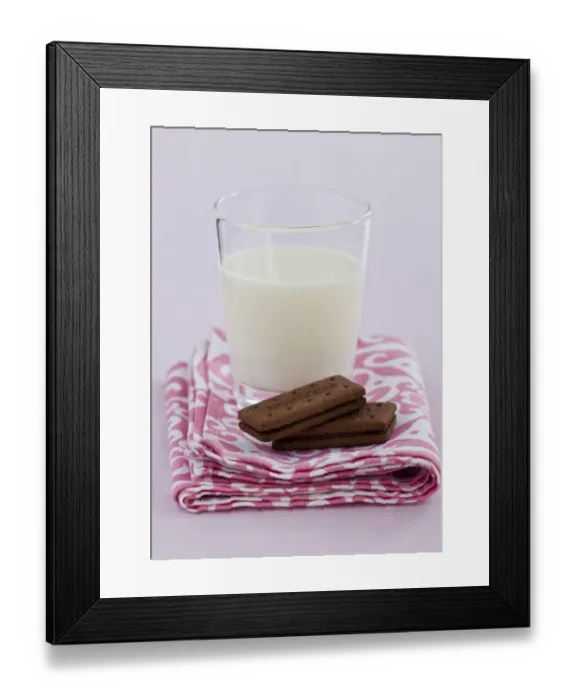 Framed Print : Bedtime snack of a glass of cold fresh milk with bourbon chocolate biscuits credit Framed Print : Bedtime snack of a glass of cold fresh milk with bourbon chocolate biscuits credit