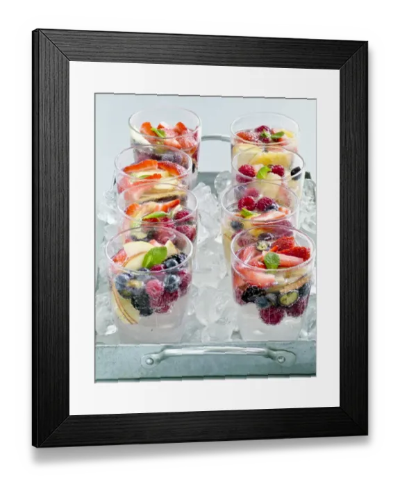 Framed Print : Sparkling water with fresh fruit and berries in glasses sittin gon crushed ice Framed Print : Sparkling water with fresh fruit and berries in glasses sittin gon crushed ice