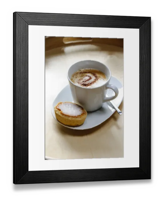 Framed Print : Cup of cappuccino with spiral of cocoa dusted on top with Swedish almond tart credit Framed Print : Cup of cappuccino with spiral of cocoa dusted on top with Swedish almond tart credit