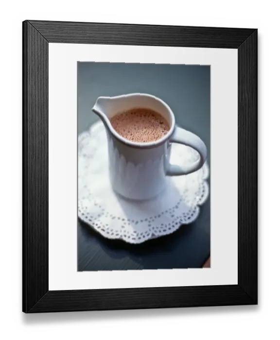 Framed Print : Jug of hot drinking chocolate on white paper lace doiley credit: Marie-Louise Avery Framed Print : Jug of hot drinking chocolate on white paper lace doiley credit: Marie-Louise Avery