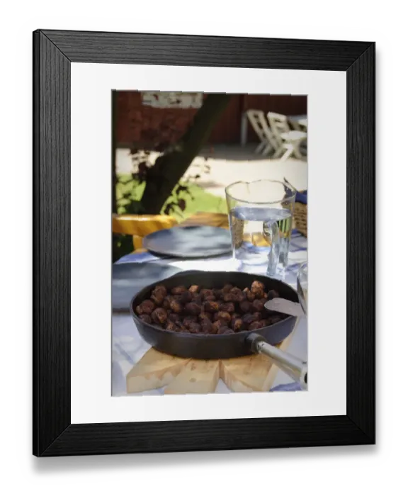 Framed Print : Frying pan of Swedish meatballs on table outside in dappled summer sunshine credit Framed Print : Frying pan of Swedish meatballs on table outside in dappled summer sunshine credit