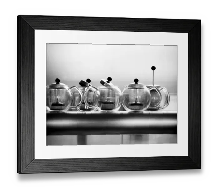 Framed Print : Glass Bodum teapots on metal shelf in restaurant credit: Marie-Louise Avery / thePictureKitchen Framed Print : Glass Bodum teapots on metal shelf in restaurant credit: Marie-Louise Avery / thePictureKitchen