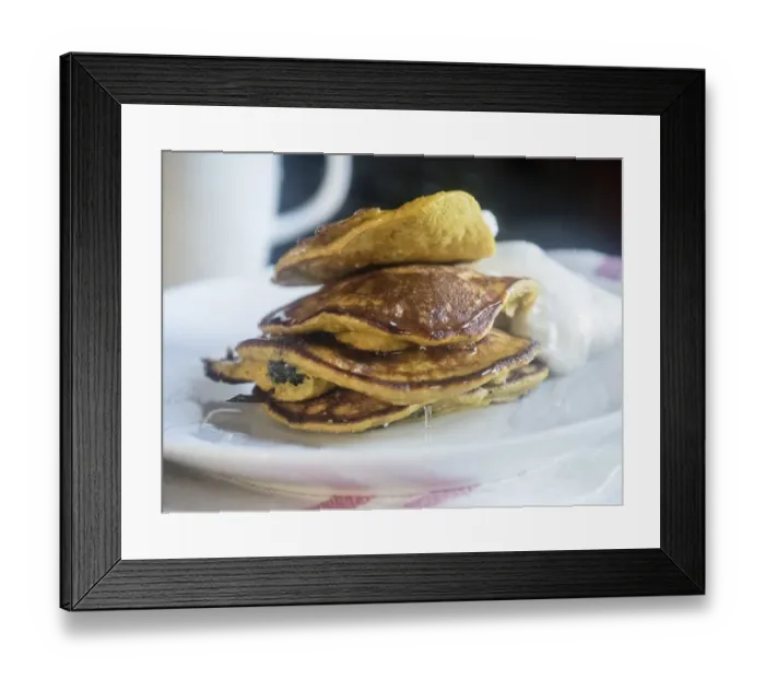 Framed Print : Breakfast pancakes made with a batter of a banana, two eggs, and 2 tablespoons of