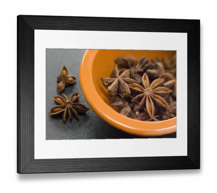 Framed Print : Dried Star anise fruits in small bowl. Also known as star aniseed, badiane or Chinese Framed Print : Dried Star anise fruits in small bowl. Also known as star aniseed, badiane or Chinese