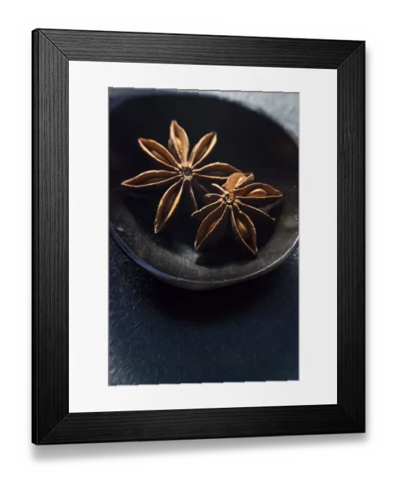 Framed Print : Dried Star anise fruits in small bowl. Also known as star aniseed, badiane or Chinese Framed Print : Dried Star anise fruits in small bowl. Also known as star aniseed, badiane or Chinese