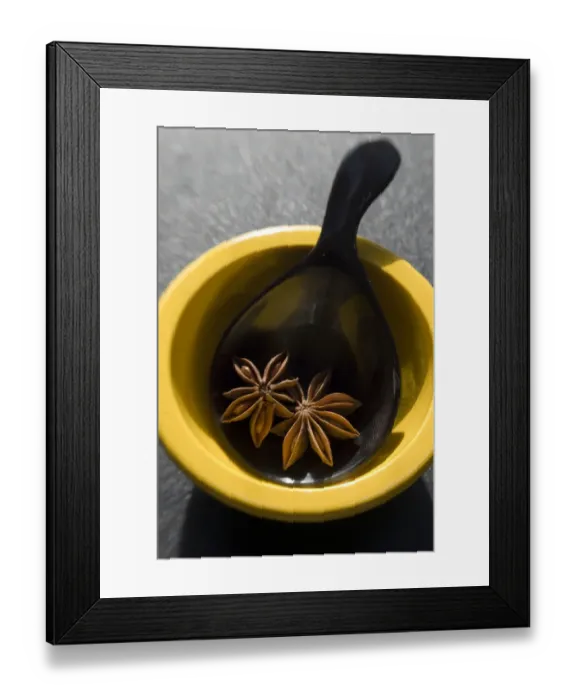 Framed Print : Dried Star anise fruits in small bowl. Also known as star aniseed, badiane or Chinese Framed Print : Dried Star anise fruits in small bowl. Also known as star aniseed, badiane or Chinese