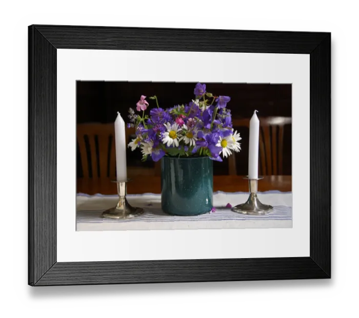 Framed Print : Bouquet of country garden flowers in enamel pot on table with silver candlesticks Framed Print : Bouquet of country garden flowers in enamel pot on table with silver candlesticks