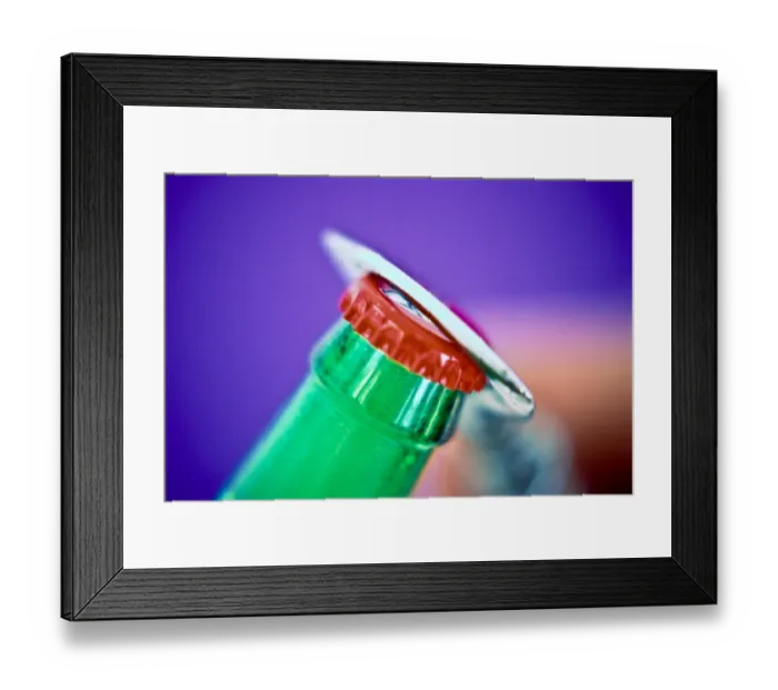 Framed Print : Bottle opener removing cap from bottle of beer credit: Marie-Louise Avery / thePictureKitchen Framed Print : Bottle opener removing cap from bottle of beer credit: Marie-Louise Avery / thePictureKitchen