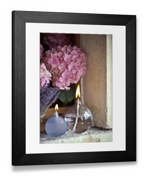 Framed Print : Two oil burner lamps with pink hydrangea and lavender in window niche credit: Marie-Louise Framed Print : Two oil burner lamps with pink hydrangea and lavender in window niche credit: Marie-Louise