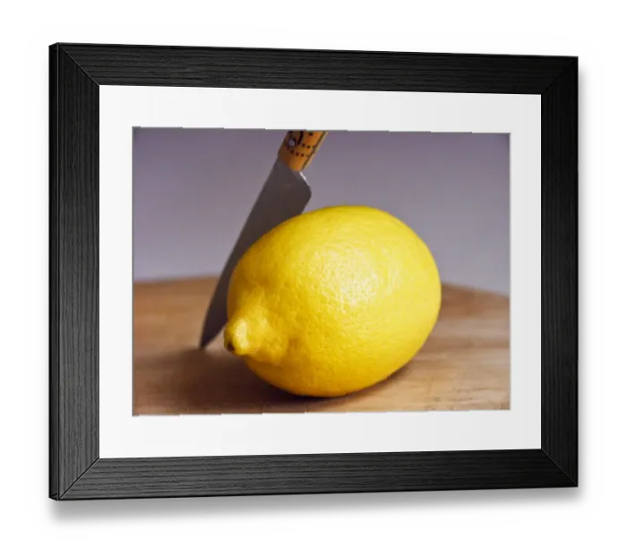 Framed Print : Whole fresh lemon with knife on cutting board credit: Marie-Louise Avery / thePictureKitchen Framed Print : Whole fresh lemon with knife on cutting board credit: Marie-Louise Avery / thePictureKitchen
