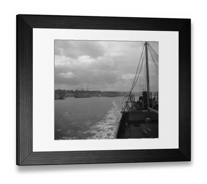 Framed Print : Ship steams up the river Thames past HMS Worcester in Greenhithe. 1936 Framed Print : Ship steams up the river Thames past HMS Worcester in Greenhithe. 1936