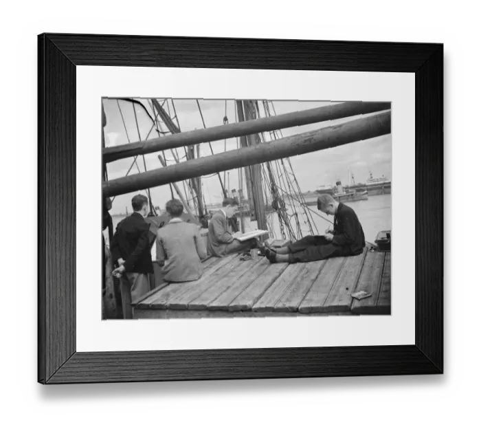 Framed Print : Pupils from the art school sit on the deck of a Thames Barge drawing pictures in Framed Print : Pupils from the art school sit on the deck of a Thames Barge drawing pictures in