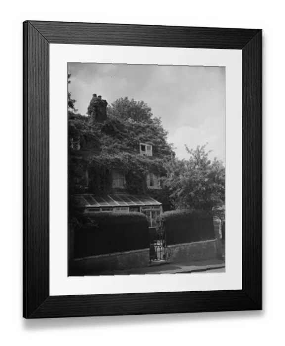 Framed Print : The front of a cottage in Sevenoaks covered in ivy. 1938