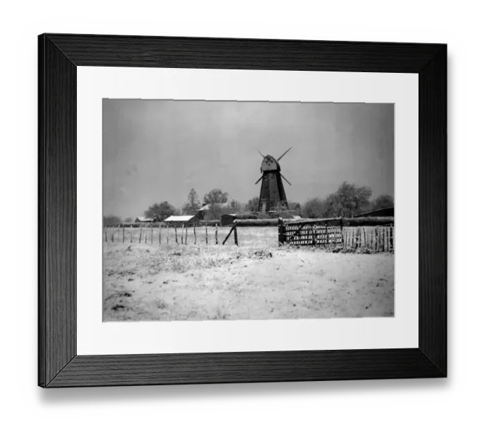 Framed Print : Windmill in white after early snow. Surrounded by a carpet of crisp powdery snow Framed Print : Windmill in white after early snow. Surrounded by a carpet of crisp powdery snow