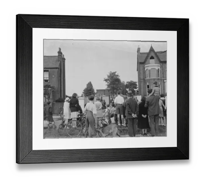 Framed Print : Locals gather at the site of the timber yard fire in Bexleyheath, Kent
