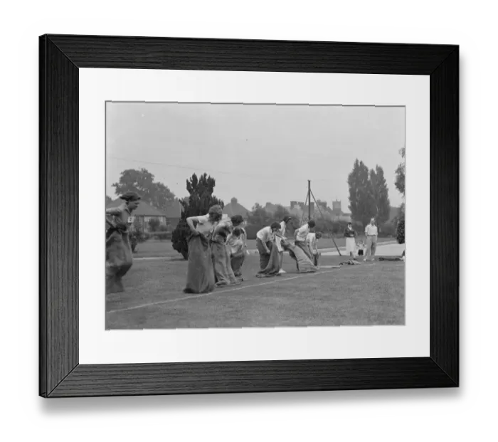 Framed Print : Wallingraph Sports in Eltham, Kent. Girls get ready for the sack race