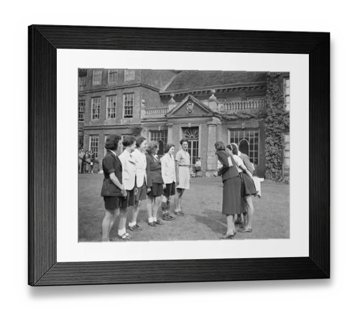 Framed Print : A girls bicycle rally at Lullingstone Castle in Kent. The girls parade in front