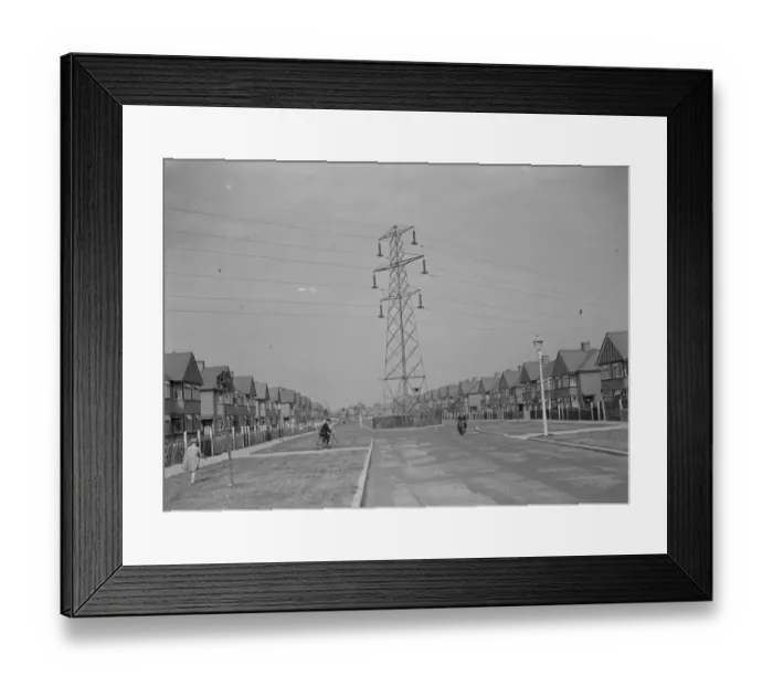 Framed Print : Electricity pylons crossing the road in Sidcup, Kent. 1935 Framed Print : Electricity pylons crossing the road in Sidcup, Kent. 1935