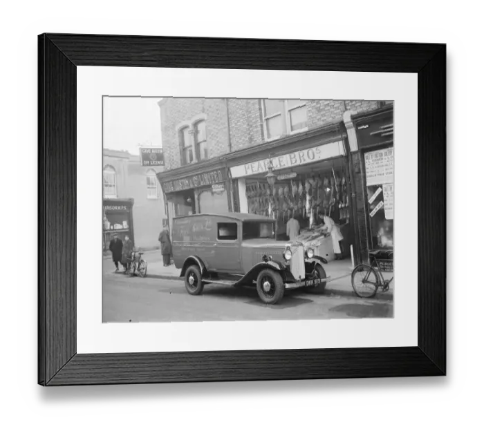 Framed Print : A Bedford truck belonging to Pearce Bros Ltd, the fishmongers and poulterers, parked Framed Print : A Bedford truck belonging to Pearce Bros Ltd, the fishmongers and poulterers, parked