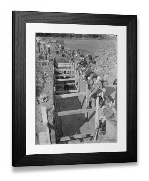 Framed Print : Children at school in Sidcup, Kent, during wartime. Here they are watching Framed Print : Children at school in Sidcup, Kent, during wartime. Here they are watching