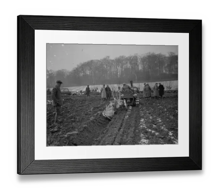 Framed Print : Farmers watch a ploughing demonstration with the new Melotte tractor Framed Print : Farmers watch a ploughing demonstration with the new Melotte tractor