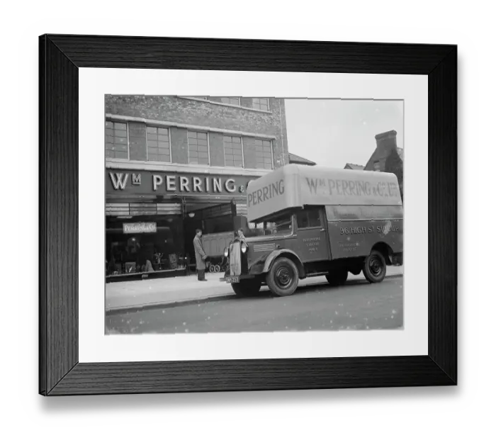 Framed Print : A Bedford truck belonging to W Perring and Co Ltd, the house furnishers. Workers Framed Print : A Bedford truck belonging to W Perring and Co Ltd, the house furnishers. Workers