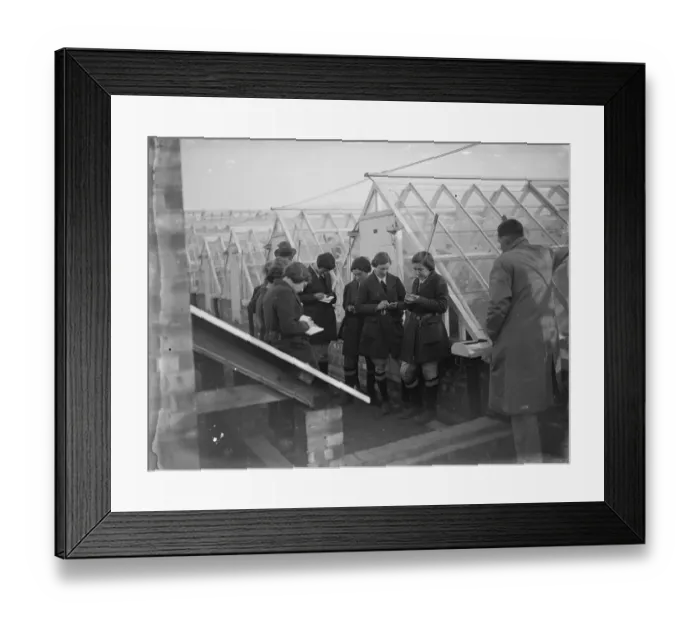 Framed Print : Young women students take notes at a glass house demonstration at the Horticultural Framed Print : Young women students take notes at a glass house demonstration at the Horticultural