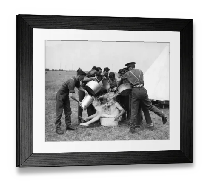 Framed Print : TA camp having fun bathing with buckets of water in the countryside. August 1938