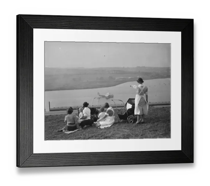 Framed Print : Nursemaids in Rochester, Kent, have a good view of the flying boat tests on Framed Print : Nursemaids in Rochester, Kent, have a good view of the flying boat tests on